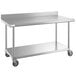 A Regency stainless steel work table with undershelf and casters.