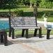 A group of MasonWays Malibu-Style benches with black legs next to a pool.