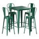 A Lancaster Table & Seating green metal bar height table with four green metal bar stools.