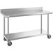 A Regency stainless steel work table with undershelf and casters.