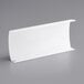 A white rectangular sign panel on a gray surface.