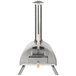 A stainless steel WPPO wood-fired pizza oven with a wood handle.