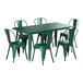 A Lancaster Table & Seating emerald green outdoor table with chairs.