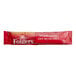 A red Folgers Classic Roast instant coffee packet.