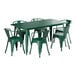 A green Lancaster Table & Seating outdoor table with six chairs.