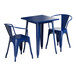 A blue square Lancaster Table & Seating outdoor table with two blue arm chairs.