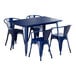 A blue metal table and chairs on an outdoor patio.