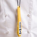 A Taylor yellow digital pocket probe thermometer with a screen.