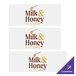 A white decal set with the Milk and Honey Cafe logo and text.