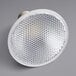 A close-up of a white Eiko dimmable LED light bulb.