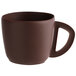 A brown Mona Lisa chocolate coffee cup with a handle.