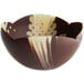 A Mona Lisa chocolate tulip cup with a marbled white and brown design.