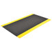 A black and yellow Notrax anti-fatigue mat with a black border.