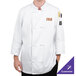 A person wearing a white Chef Revival chef coat with knot cloth buttons.