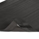A black Notrax anti-fatigue mat with a black rubber edge.
