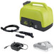 A Sun Joe green and grey portable cordless sprayer with charger.