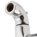 A T&S chrome wall mount mop sink faucet with lever handles.