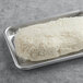 A rectangular tray of Fillo Factory Kataifi Shredded Fillo Dough on a gray surface.