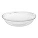 A clear pebbled acrylic bowl with a textured edge.