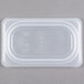 A Cambro translucent plastic lid on a plastic container.