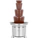 A Sephra Cortez chocolate fountain on a metal stand.