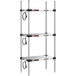 A Metro Super Erecta heated stainless steel takeout station with three shelves on chrome posts with wires.