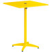 A yellow square Lancaster Table & Seating bar height table with a round top.