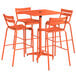 An orange Lancaster Table & Seating bar table with 4 chairs on an outdoor patio.