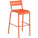 An orange bar stool with a white back.