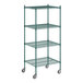 A Regency green wire shelving unit with casters.