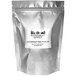 A white package of grapefruit peel powder with a black label.
