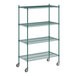 A green metal Regency wire shelving unit.