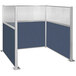 A Versare Hush Panel Ocean U-Shape Cubicle with blue and white fabric panels.