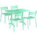 A Lancaster Table & Seating seafoam green table and chairs set.