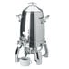 A stainless steel Vollrath Somerville coffee urn with a cup of coffee on top.
