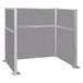 A grey Versare Hush Panel cubicle with silver metal posts.