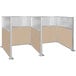 A beige Versare Hush Panel double cubicle with glass windows.