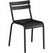 A black metal Lancaster Table & Seating chair with a backrest.