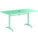 A Lancaster Table & Seating seafoam green outdoor table with black legs.