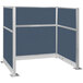 A blue Versare Hush Panel U-shaped cubicle with metal frame.