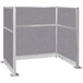 A Versare Hush Panel grey cubicle with a silver metal frame.