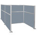 A gray cubicle with a silver frame.