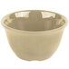A white bowl with speckled sandstone coloring.