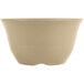 A close up of a GET Tahoe Sandstone bowl with a small hole in the bottom.