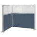 A blue and white fabric cubicle partition with a metal frame.
