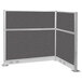 A Versare Hush Panel charcoal gray L-shaped cubicle screen with metal frame.