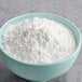 A bowl of Florida Crystals Organic 10X Powdered Raw Cane Sugar.