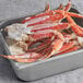 A tray of frozen 8-10 oz. Snow Crab Clusters.