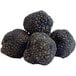 A close-up of Urbani Fresh Black Summer Truffles.