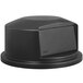 A black Rubbermaid round dome lid on top of a 32 gallon trash can.